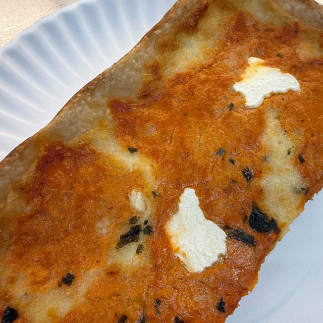 Grandma Vodka Pizza Slice.